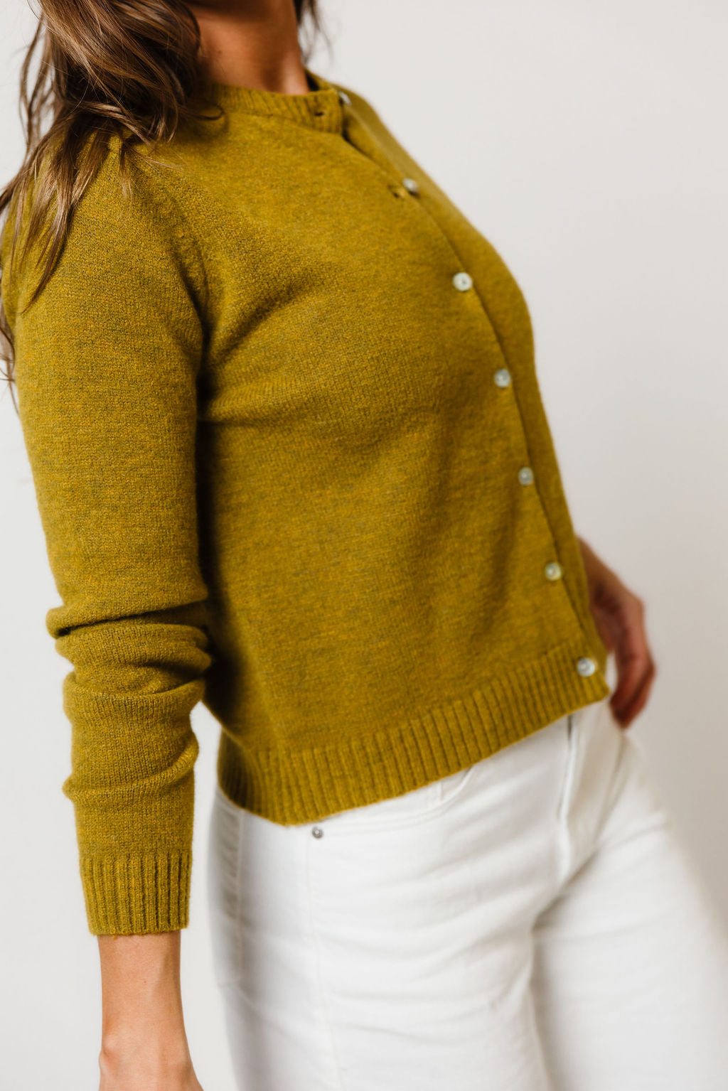 Elara Cardigan in Moss, studio view