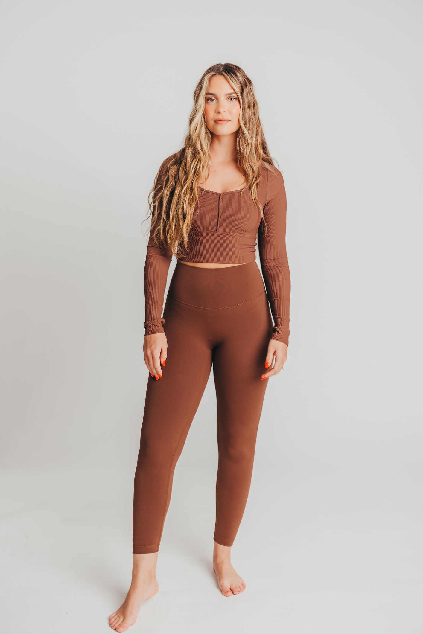 Worth The Label Cropped Long Sleeve Top in Brown