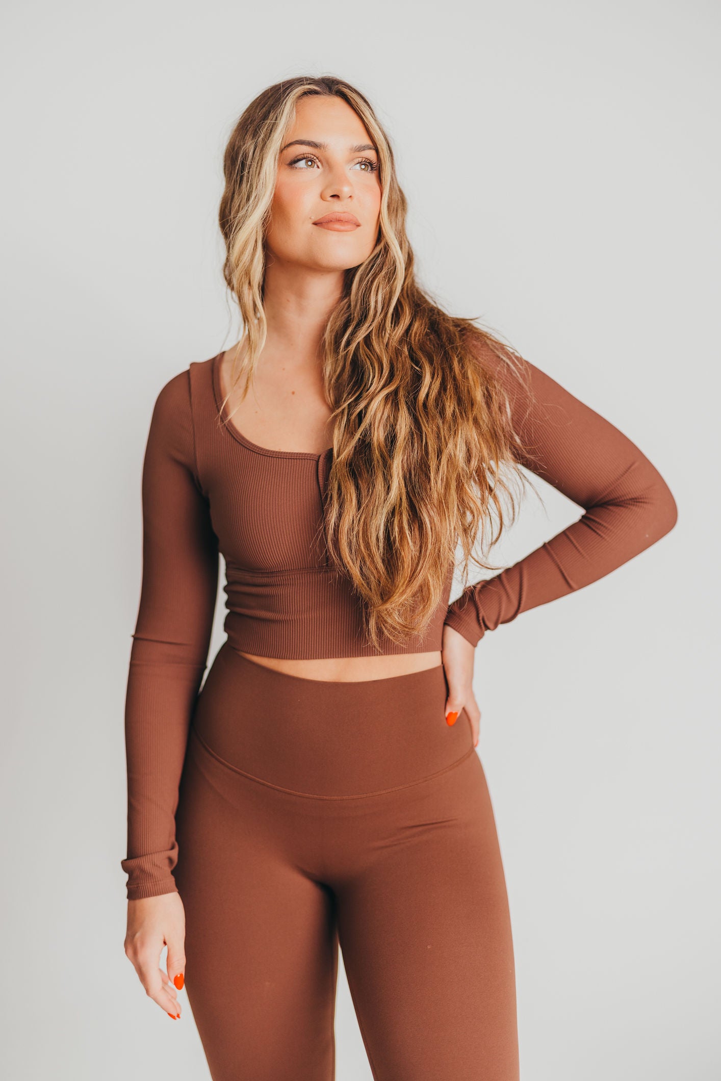 Worth The Label Cropped Long Sleeve Top in Brown