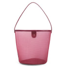 Vancouver mesh bucket bag in a rosy wine pink with a single shoulder strap and front tab, shown on a white background