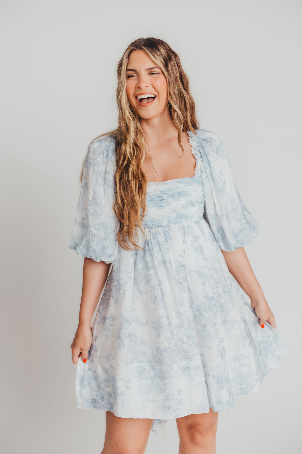 Melody Mini Dress with Pleats and Bow Detail in Baby Blue Floral