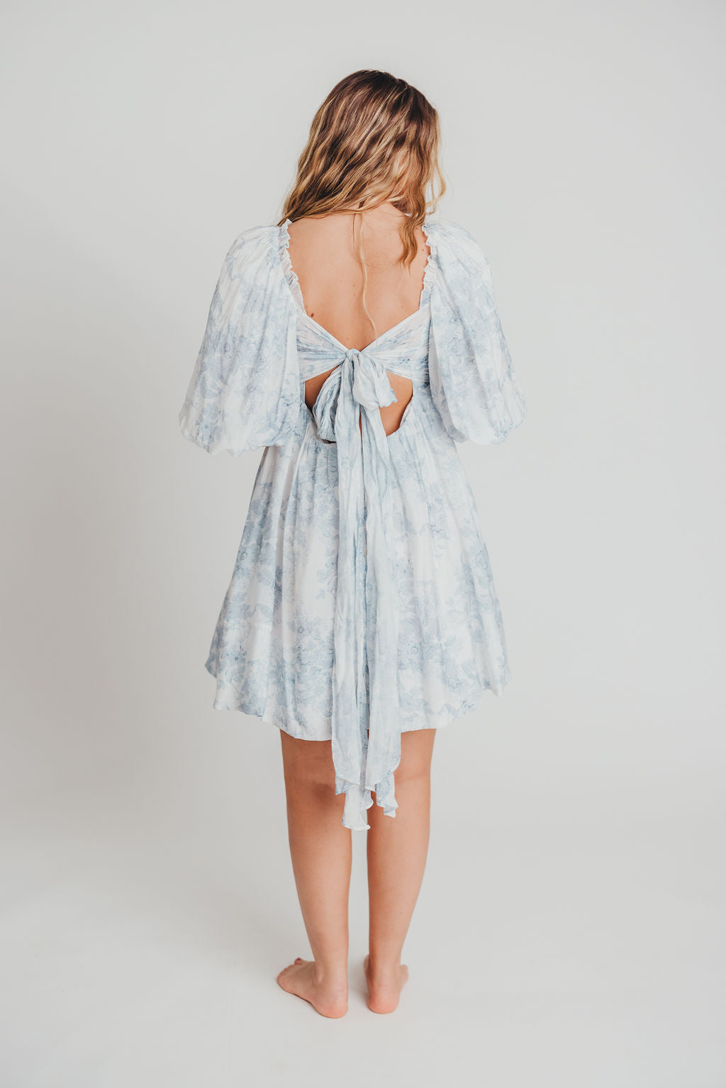 Melody Mini Dress with Pleats and Bow Detail in Baby Blue Floral