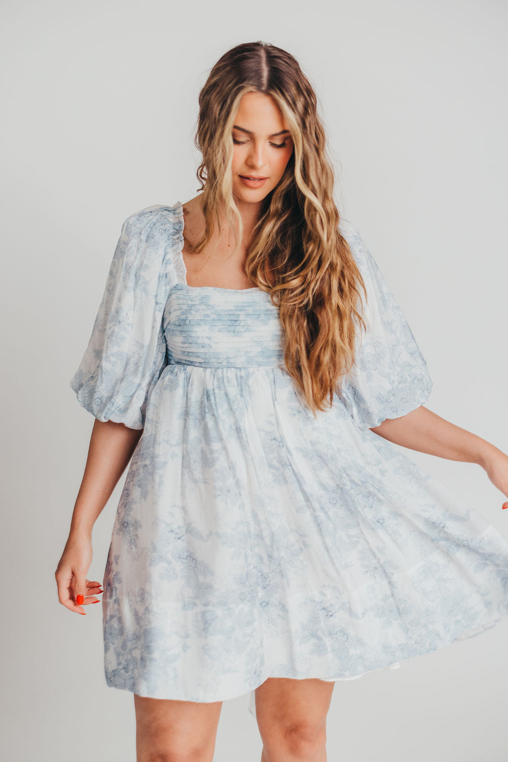 Melody Mini Dress with Pleats and Bow Detail in Baby Blue Floral